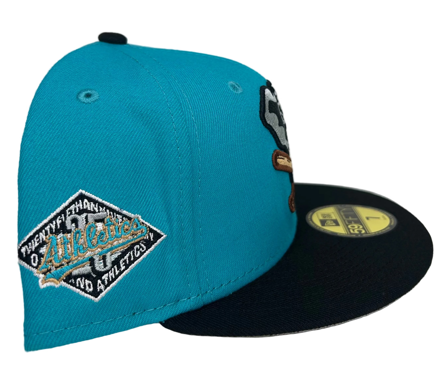 New Era Oakland Athletics 59FIFTY fitted hat featuring a teal crown, black visor, and a special 25th Anniversary side patch.