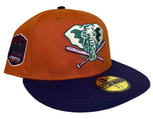 New Era Cactus Fruit Oakland Athletics 50th Anniversary Patch Stomper Hat features a burnt orange crown, a purple brim, a green under-visor, and a 50th-anniversary patch.