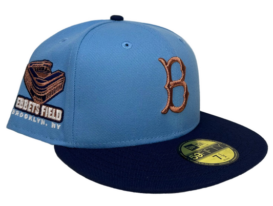 New Era Brooklyn Dodgers 59FIFTY fitted hat with a sky blue crown, navy visor, and copper embroidered logo.