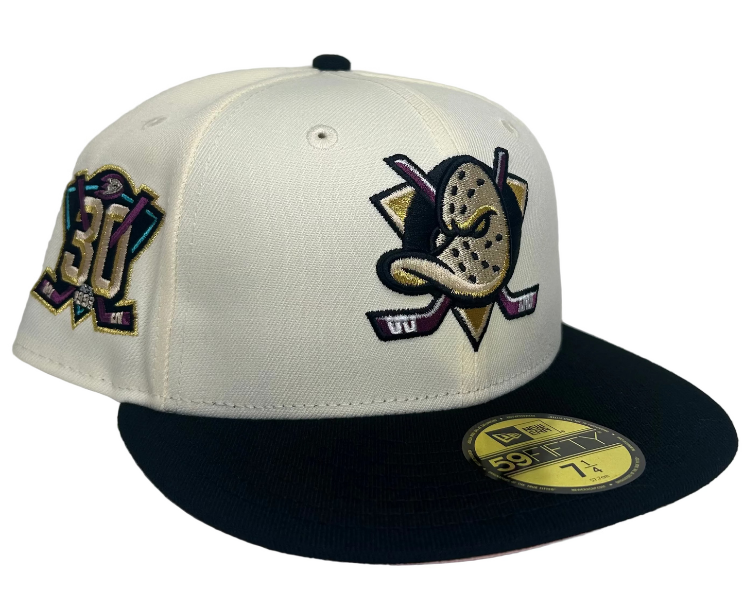 New Era Anaheim Ducks 59FIFTY 30th anniversary fitted cap featuring a chrome white crown, black visor, and pink undervisor.