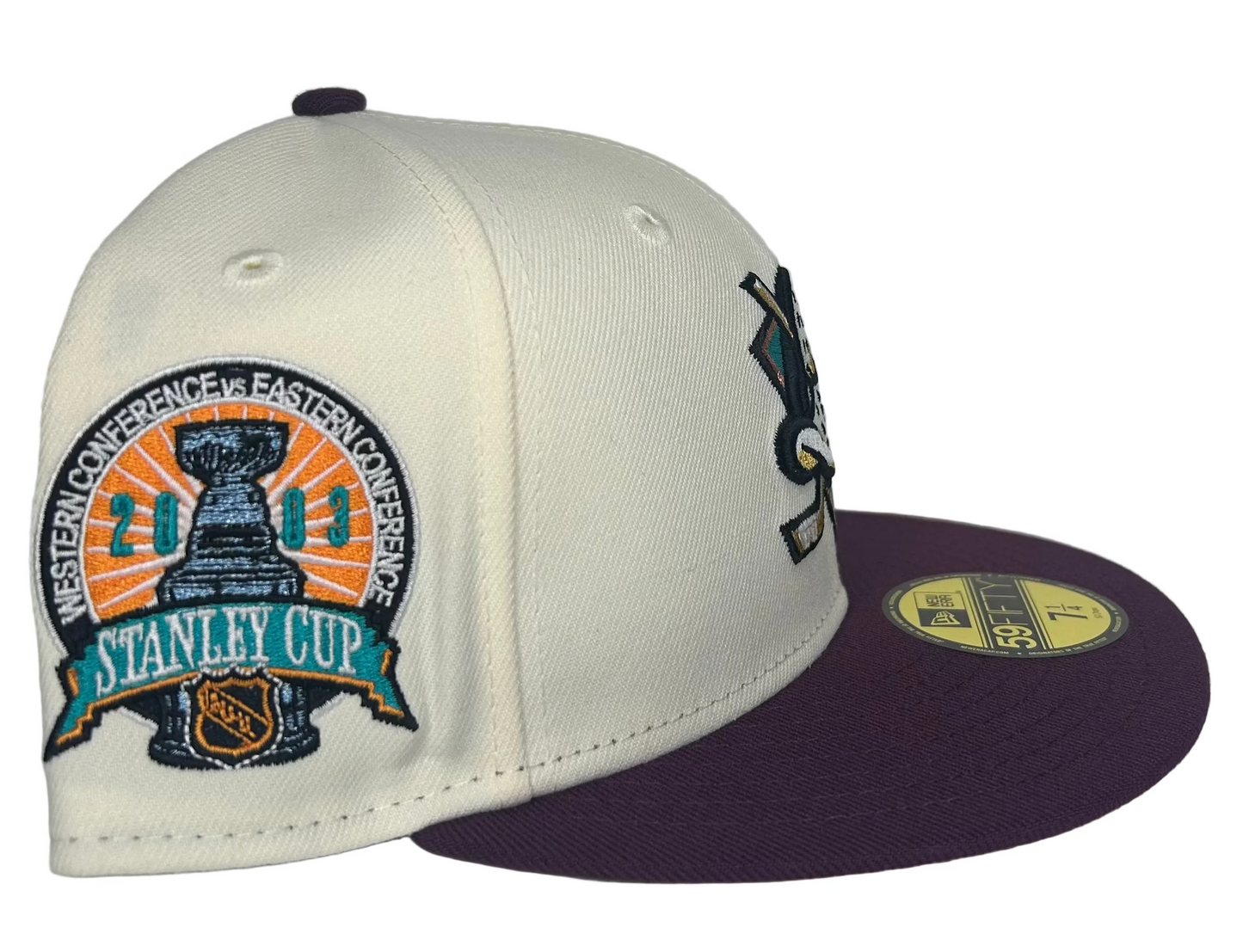 New Era Anaheim Ducks 59Fifty fitted hat featuring a white crown, purple brim, and a special patch commemorating the Stanley Cup.