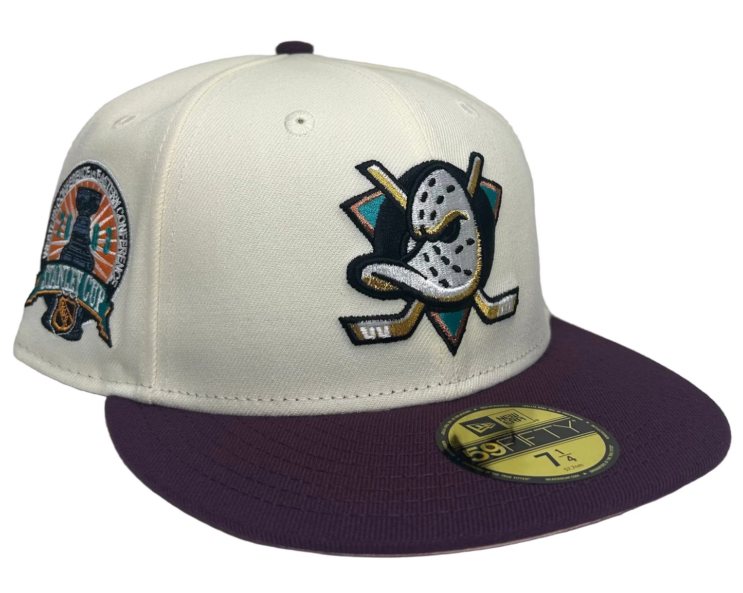 New Era Anaheim Ducks 59Fifty fitted hat featuring a white crown, purple brim, and a special patch commemorating the Stanley Cup.