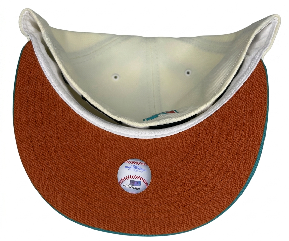 New Era 59FIFTY San Francisco Giants "South Beach" fitted hat featuring a teal visor and custom side patch.