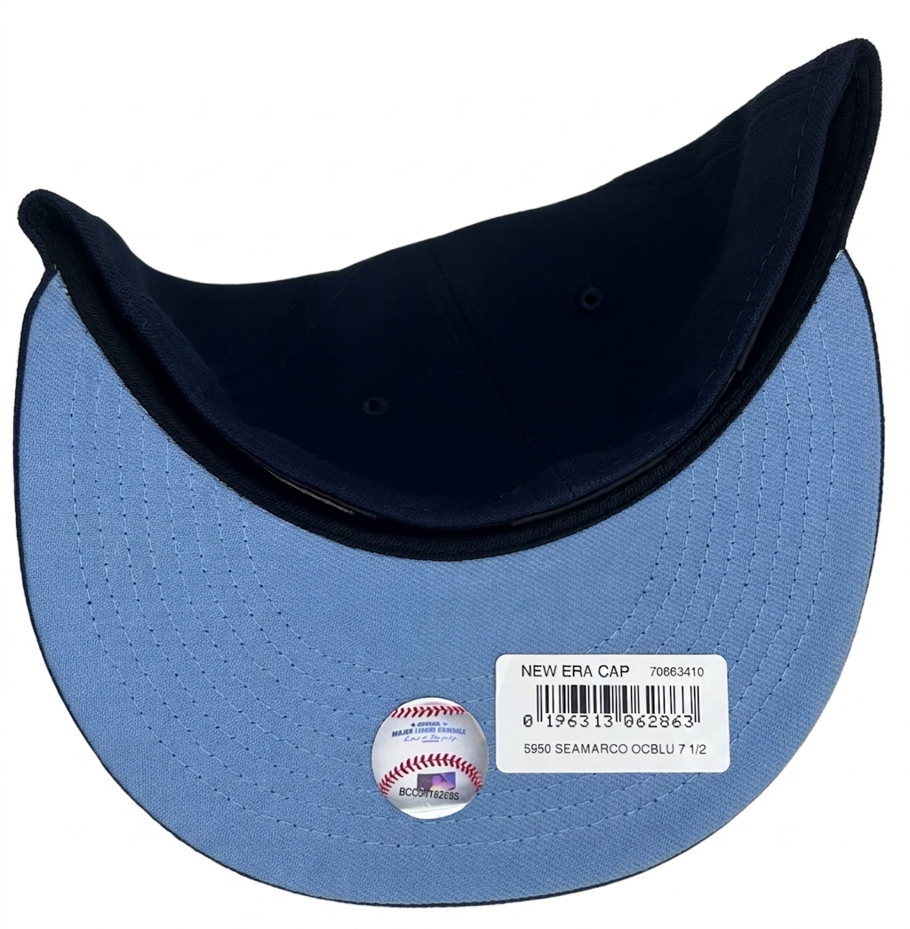 New Era 59Fifty Seattle Mariners "Chasing M's" fitted hat features an ocean blue crown and a light blue undervisor.