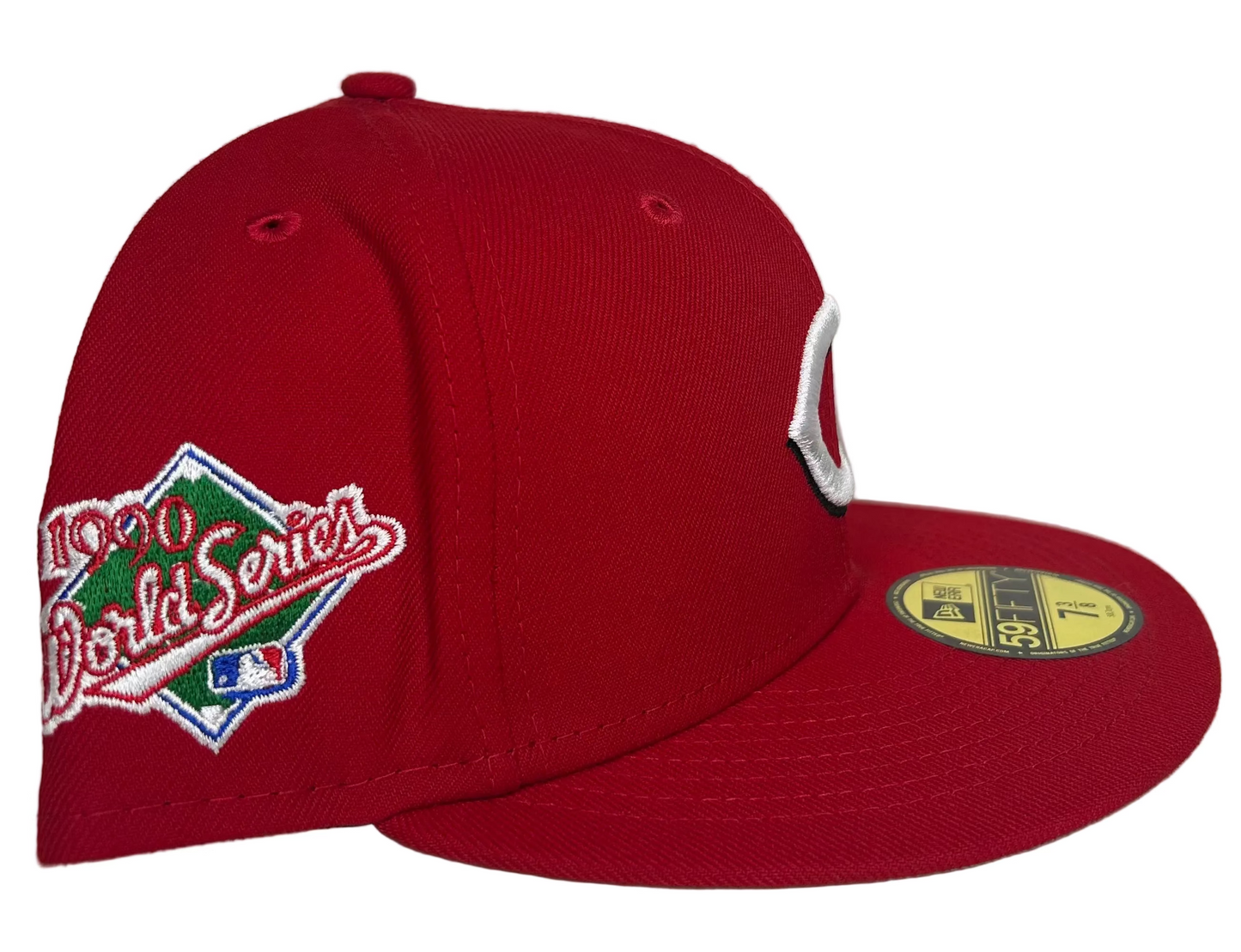 New Era 1990 World Series fitted cap featuring a prominent Cincinnati Reds "C" logo.