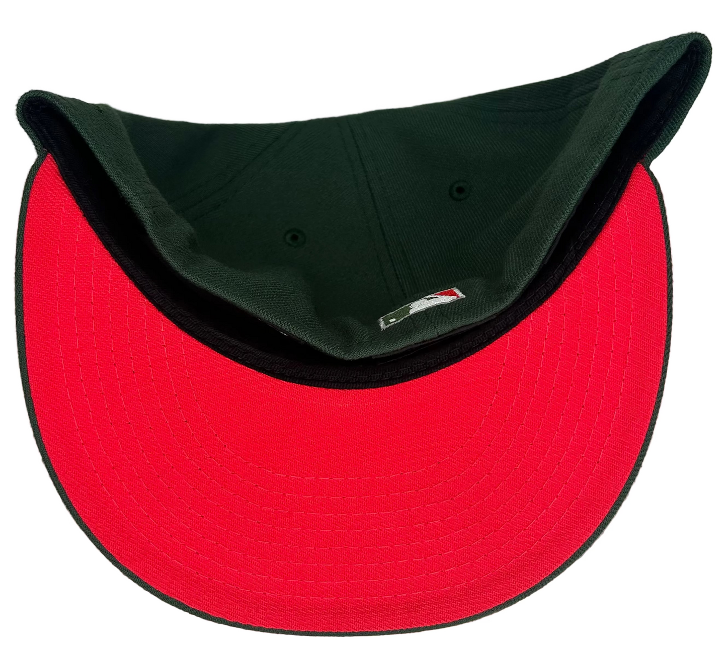 New Era 59FIFTY fitted hat features a deep green crown and a 50th-anniversary patch on the side.