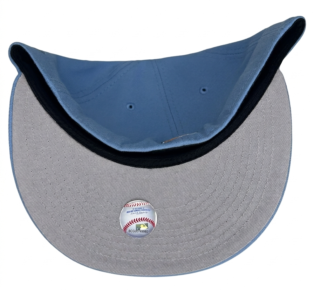 New Era Anaheim Angels 59Fifty fitted cap is featured in a light blue colorway with a 50th Anniversary side patch.