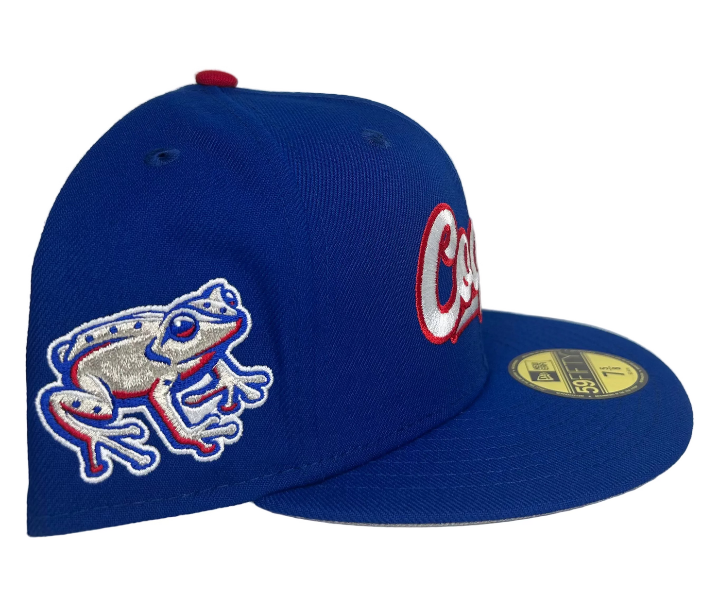New Era Lehigh Valley IronPigs "Coquis" 59FIFTY fitted cap features a prominent embroidered "Coquis" logo on the front and a coqui frog patch on the side.