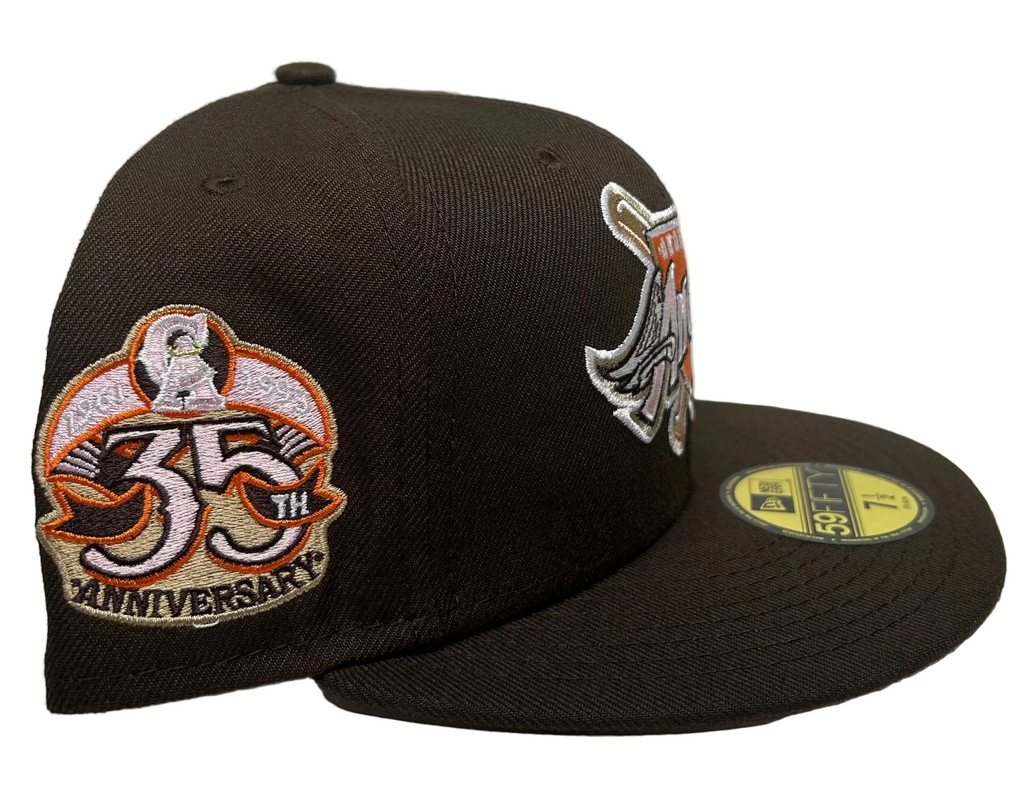 New Era 59Fifty fitted cap features a brown crown and visor with a prominent embroidered Los Angeles Angels logo and a special 35th Anniversary side patch.