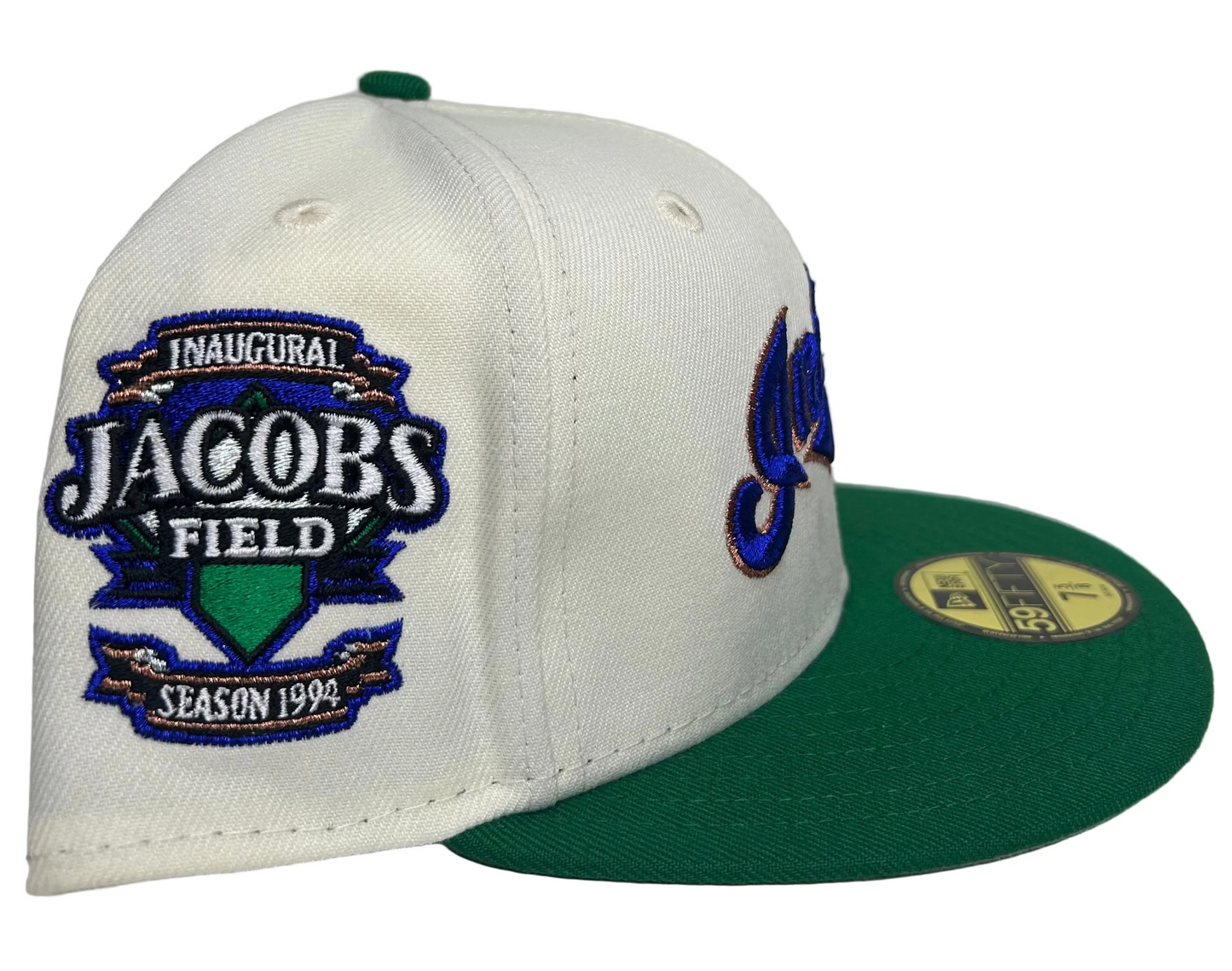 New Era Cleveland Indians 59Fifty Fitted Hat featuring a cream crown, green visor, a commemorative 1994 Jacobs Field patch.