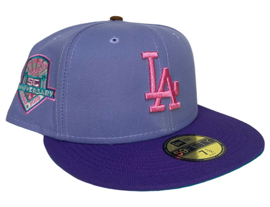 New Era Los Angeles Dodgers 59FIFTY fitted hat featuring a lavender crown and a purple visor with a 50th-anniversary patch.