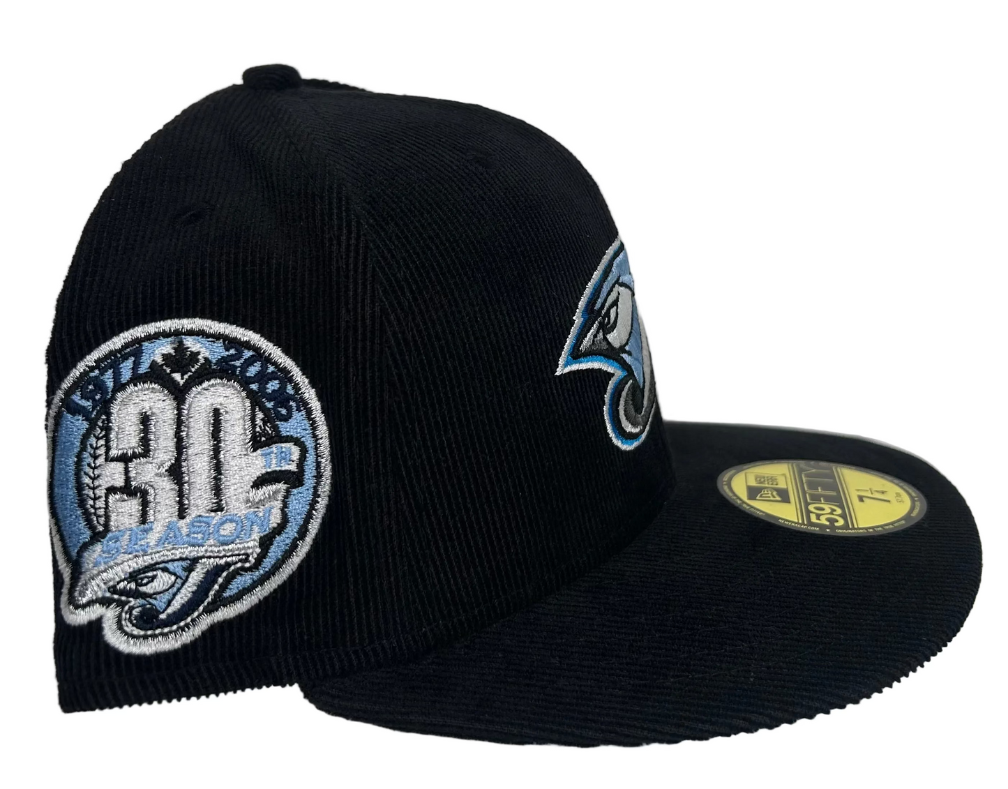 New Era Toronto Blue Jays Corduroy 30th Anniversary corduroy 59Fifty fitted cap featuring a prominent embroidered team logo.