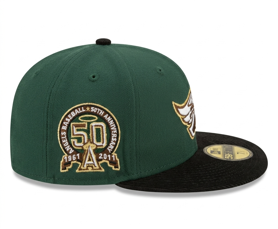 New Era Anaheim Angels 50th Anniversary Fitted Hat features a green crown with a black corduroy brim and a commemorative side patch.