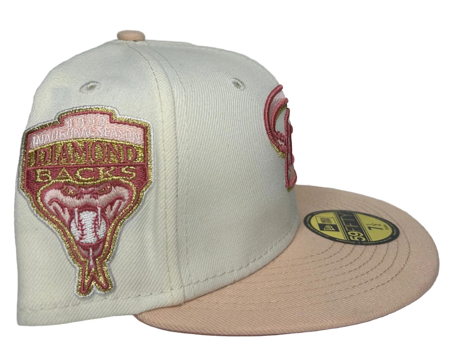 New Era 59FIFTY fitted hat features an off-white crown with a pink visor and a 1998 Inaugural Season side patch.