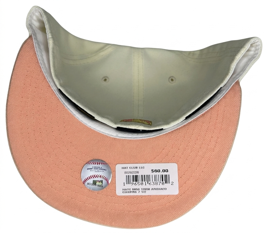 New Era 59FIFTY fitted hat features an off-white crown with a pink visor and a 1998 Inaugural Season side patch.