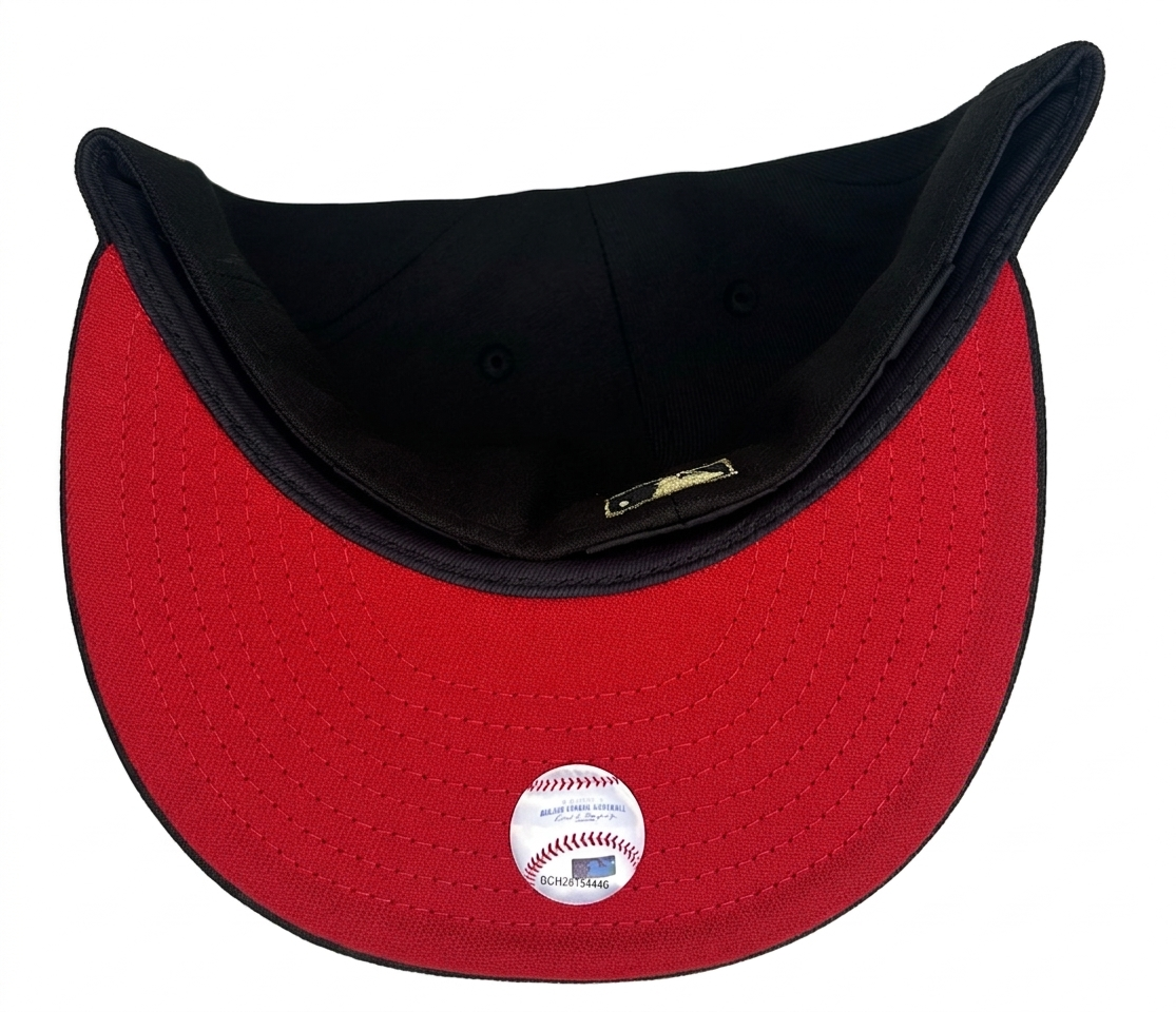 New Era Baltimore Orioles 59Fifty fitted hat features a black crown, a red undervisor, and a metallic gold "O's" logo on the front.