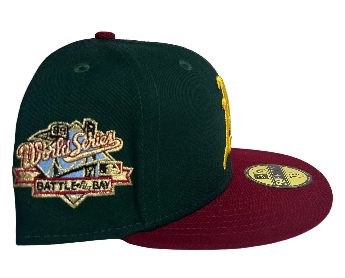 New Era Oakland Athletics 59FIFTY fitted hat featuring a dark green crown, maroon brim, and a 1989 World Series patch.