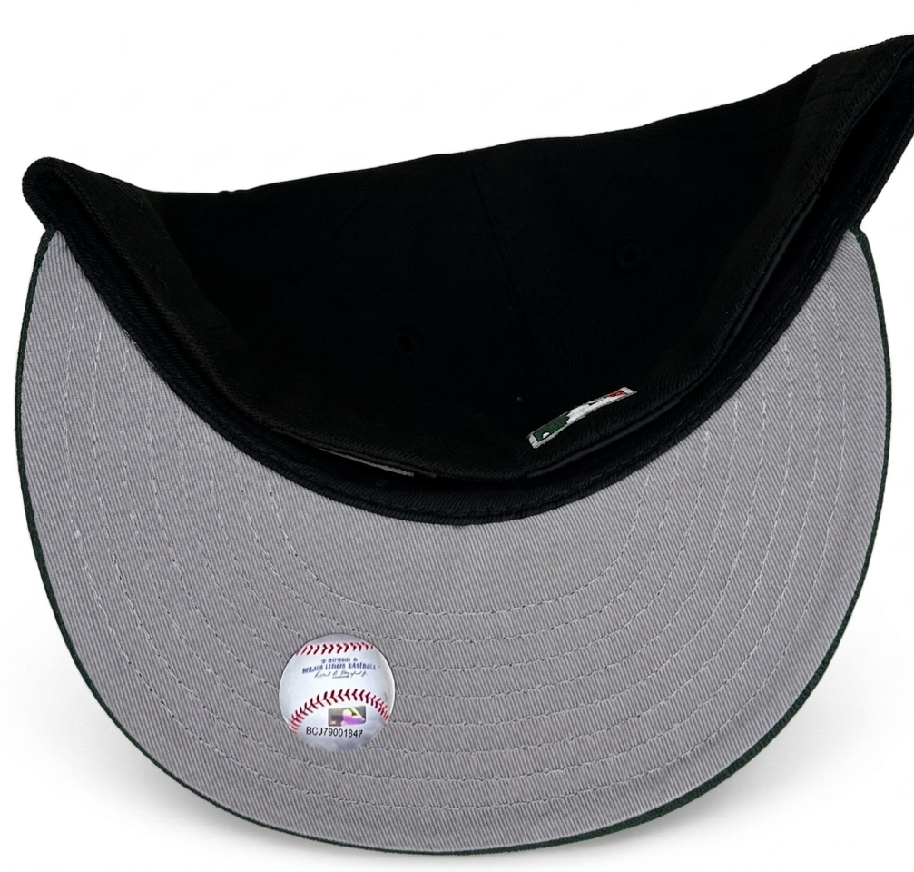 Arizona Diamondbacks New Era 59FIFTY fitted hat features a black crown with a dark green brim and an inaugural season side patch.
