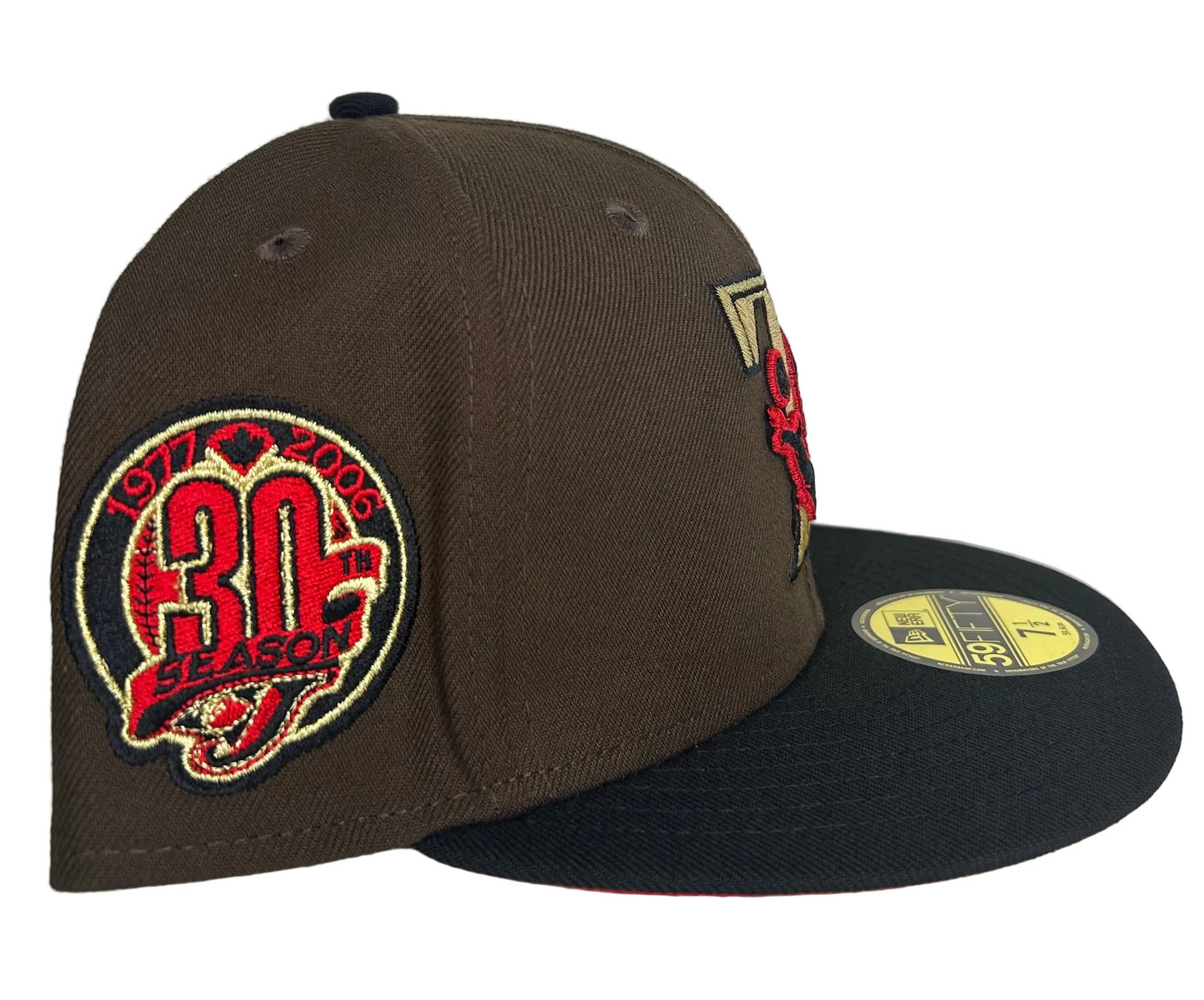 New Era Toronto Blue Jays "Buried Treasure" collection hat features a brown crown, black visor, and a red underbrim.