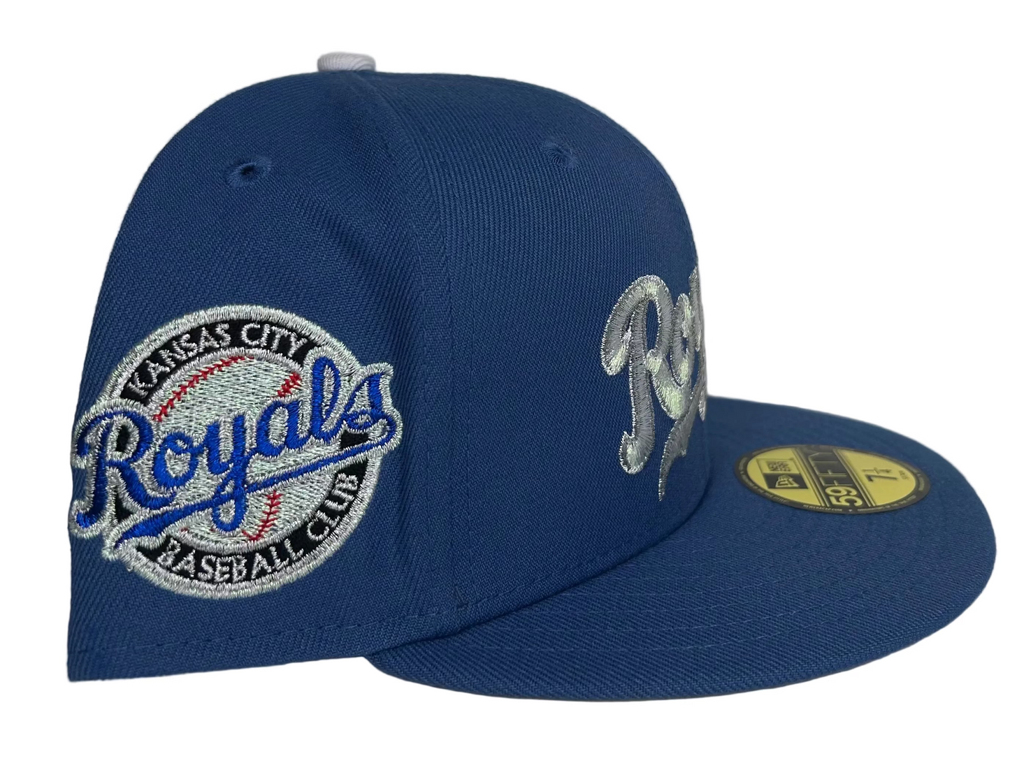 Kansas City Royals New Era 59FIFTY fitted cap featuring a prominent silver script logo and a side patch.