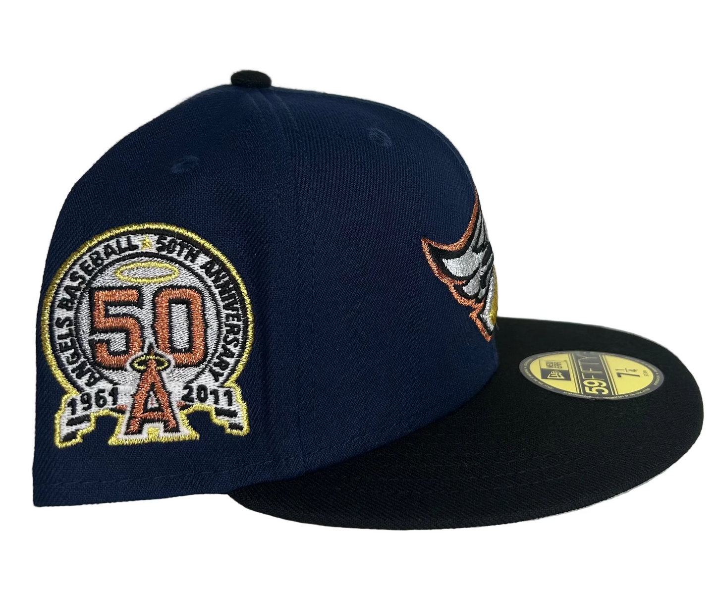 New Era 59FIFTY fitted hat featuring a navy crown, black visor, and a special 50th Anniversary side patch for the Anaheim Angels.