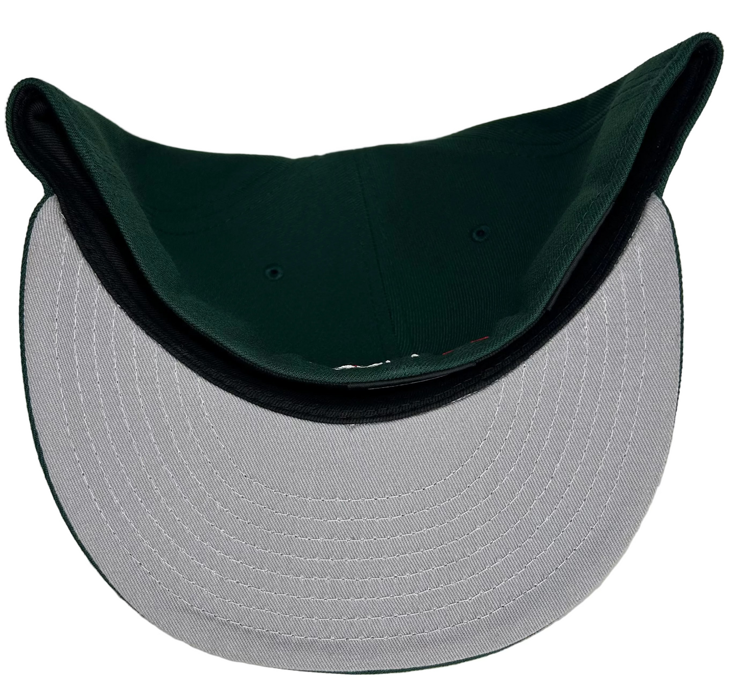 New Era Mexico Serie del Caribe 2024 59FIFTY fitted hat features a dark green crown with a red button and a prominent tri-color "M" logo on the front.