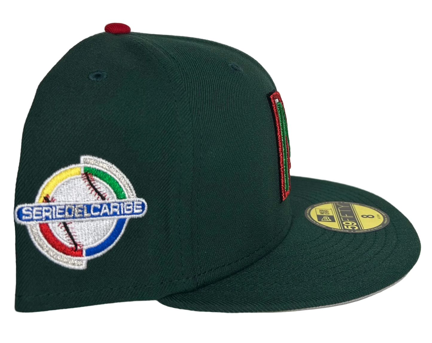 New Era Mexico Serie del Caribe 2024 59FIFTY fitted hat features a dark green crown with a red button and a prominent tri-color "M" logo on the front.